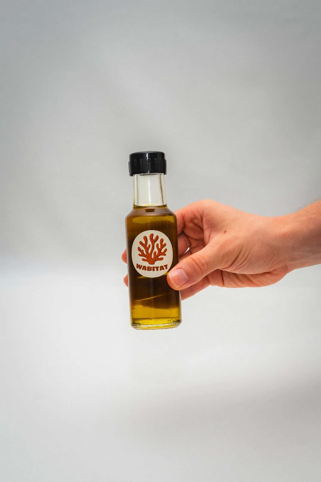 Reusable glass jar of local snacks replacing single-use wrappers